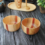 Load image into Gallery viewer, Two wooden handmade bowls in birchwood with a black sirish wood accent.
