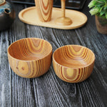 Load image into Gallery viewer, Two wooden handmade bowls in a patterned plywood style.
