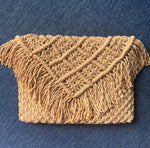 Load image into Gallery viewer, A brown handcrafted macrame clutch handbag with fringed detailing
