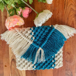 Load image into Gallery viewer, A two-toned macrame envelope clutch handbag in white and teal colour with fringe detailing
