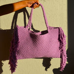 Load image into Gallery viewer, A lavender coloured handcrafted beach bag with fringe detailing
